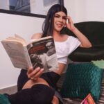 horny young transsexual reading book