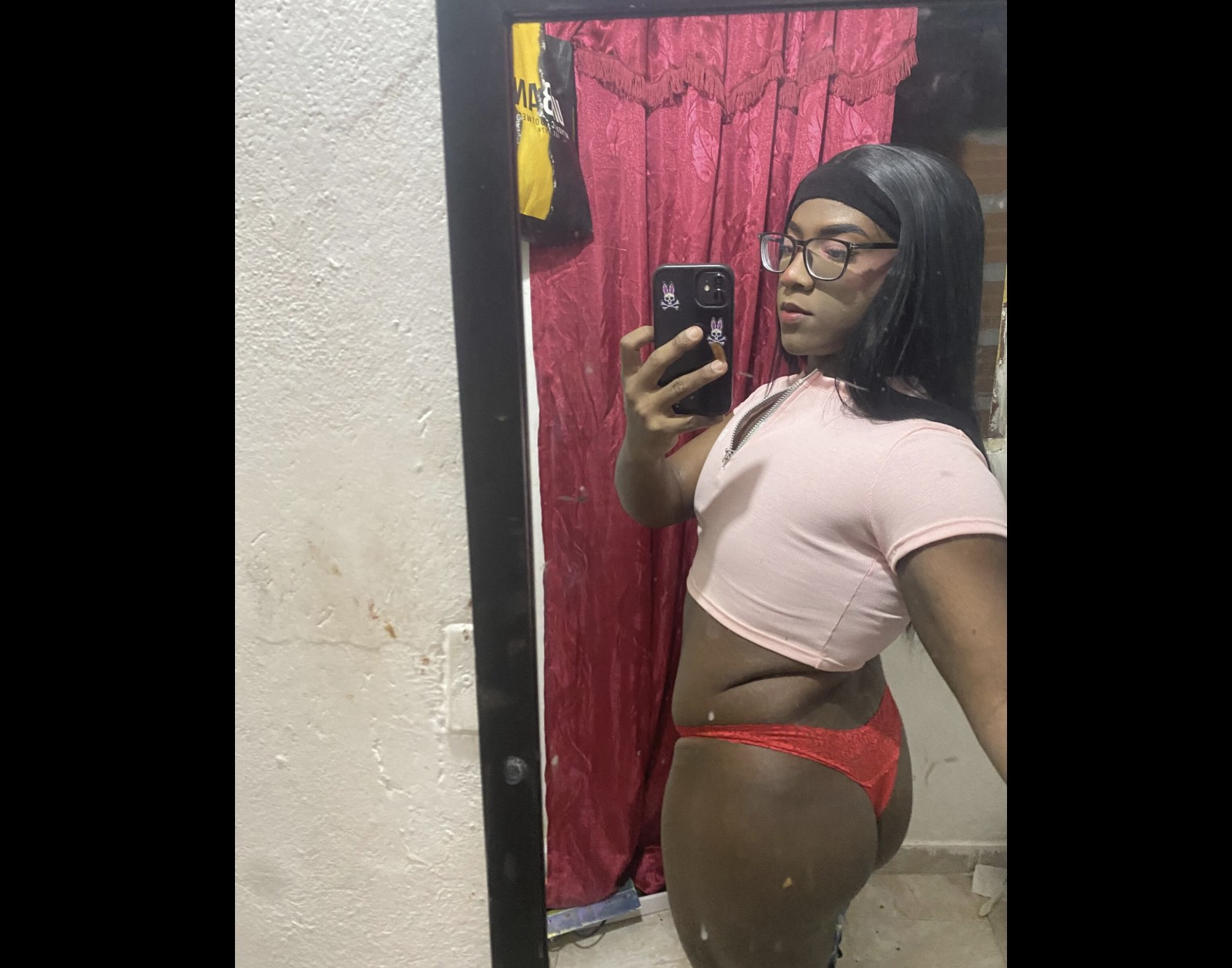black tranny cam model posing in underwear