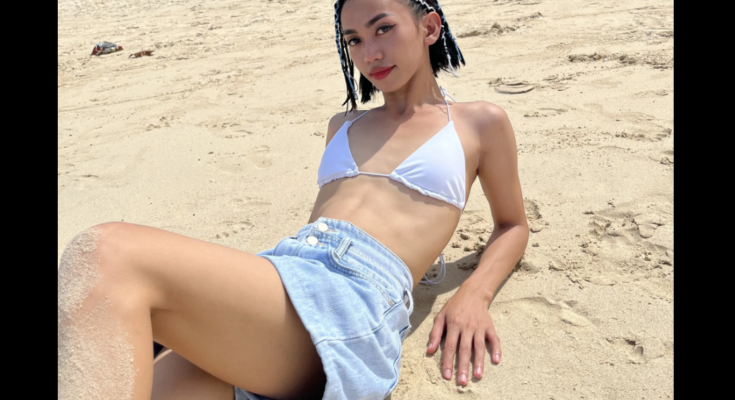 Filipina bae shemale cam girl posing on beach in skirt